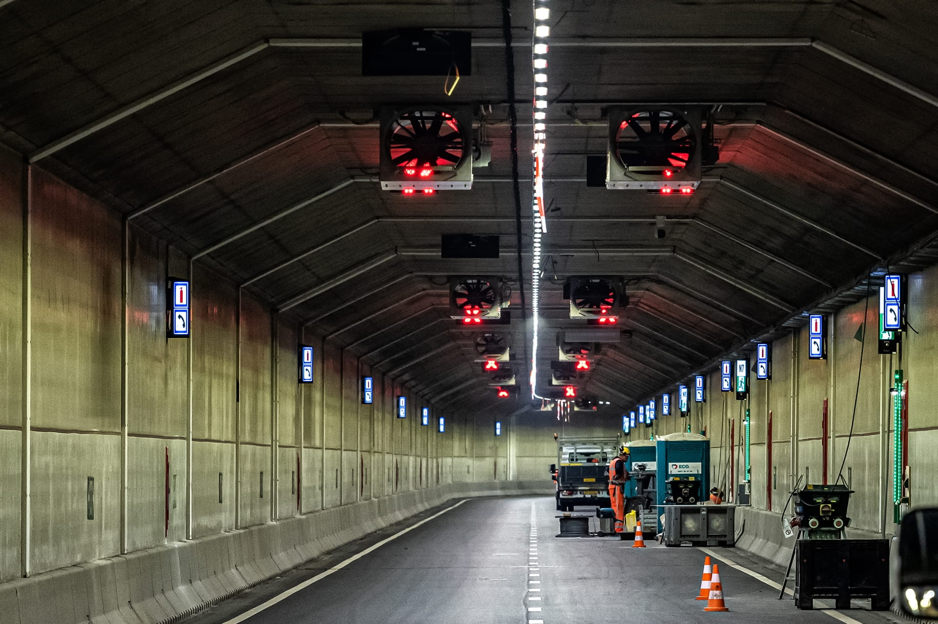 The inside of tunnel with a person working there