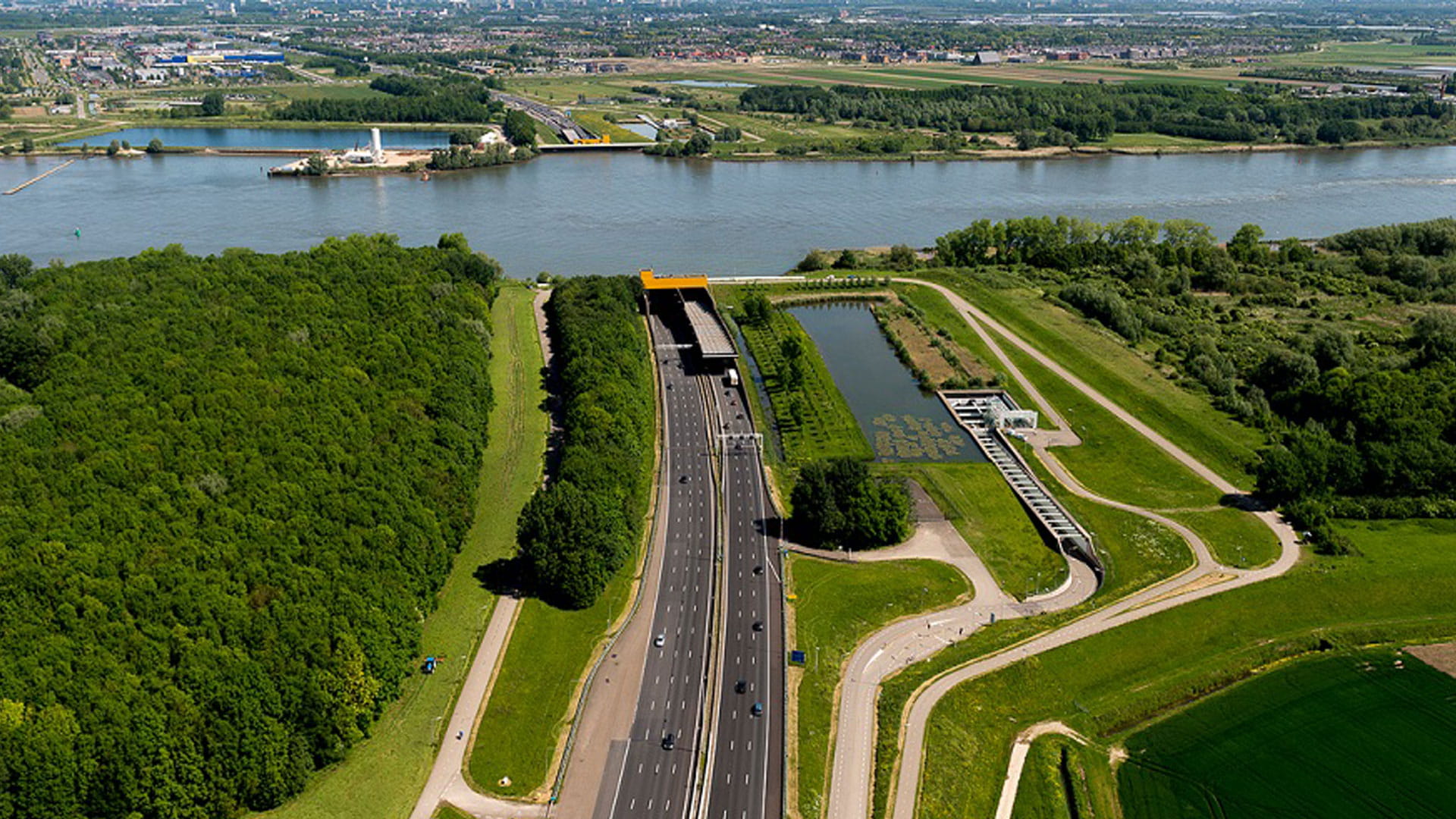 bird view of a tunnel going under the river