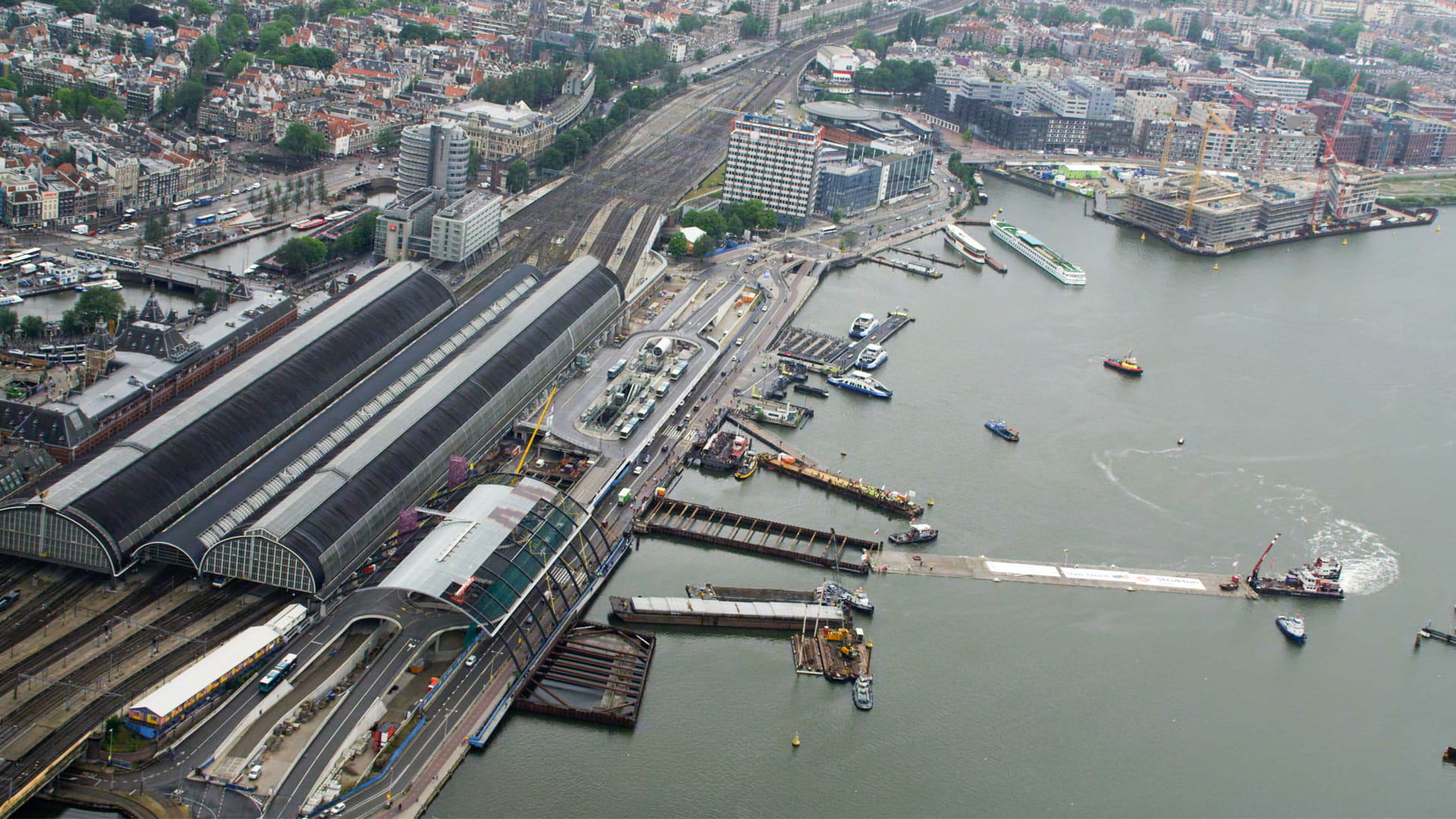 bird eye view of Amsterdam station showing construction in the water