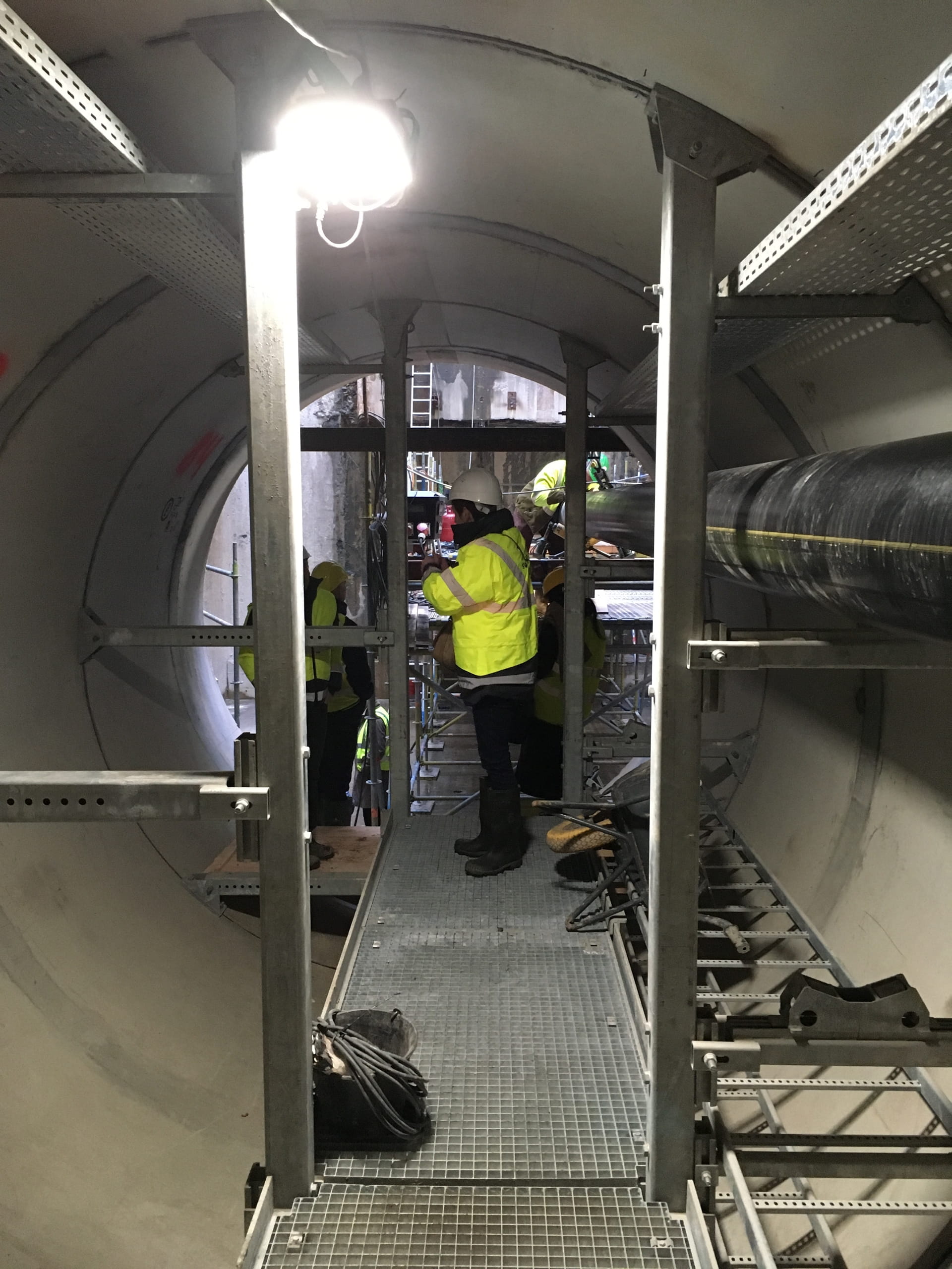 Person in bored tunnel